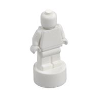 Petite statuette blanche générique non articulée sur un pied rond, référence Rebrickable 90398, élément LEGO 6073432.