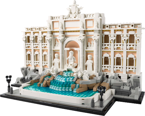 Visuel officiel du LEGO Trevi 21062 : façade blanche et beige à panneaux rosés, grandes statues blanches dans les niches, cascade et bassin bleus transparents, rochers gris, deux lampadaires noirs et couronnement central sur un socle noir.