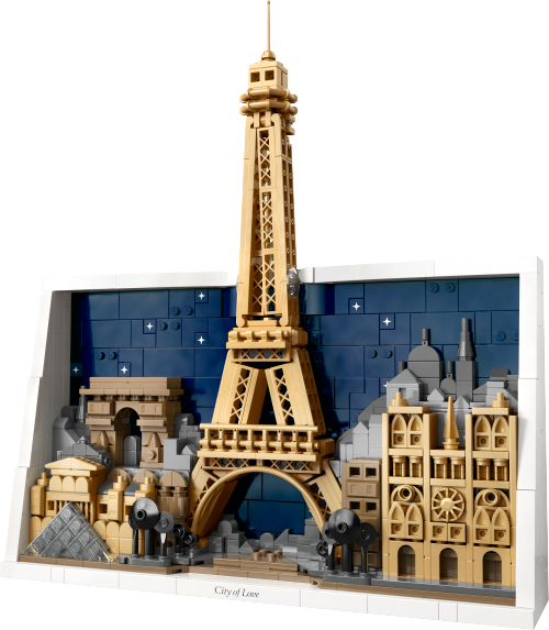 Visuel officiel de Paris, ville de l’amour LEGO 21064 : cadre blanc avec ciel bleu nuit étoilé, tour Eiffel beige dépassant en hauteur, Arc de Triomphe à gauche, Louvre et pyramide en bas à gauche, façade de Notre-Dame à droite, plaque blanche City of Love sur la bordure.
