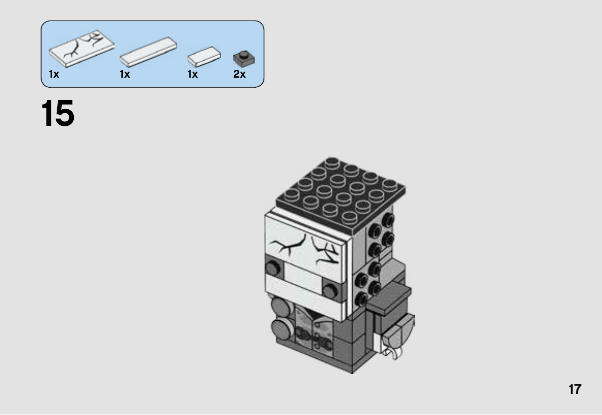 Notice LEGO 41594, page 17 : Pose de la grande tuile blanche imprimée du front 6188422 et des tuiles blanches du visage ; les deux supports gris des yeux restent visibles.