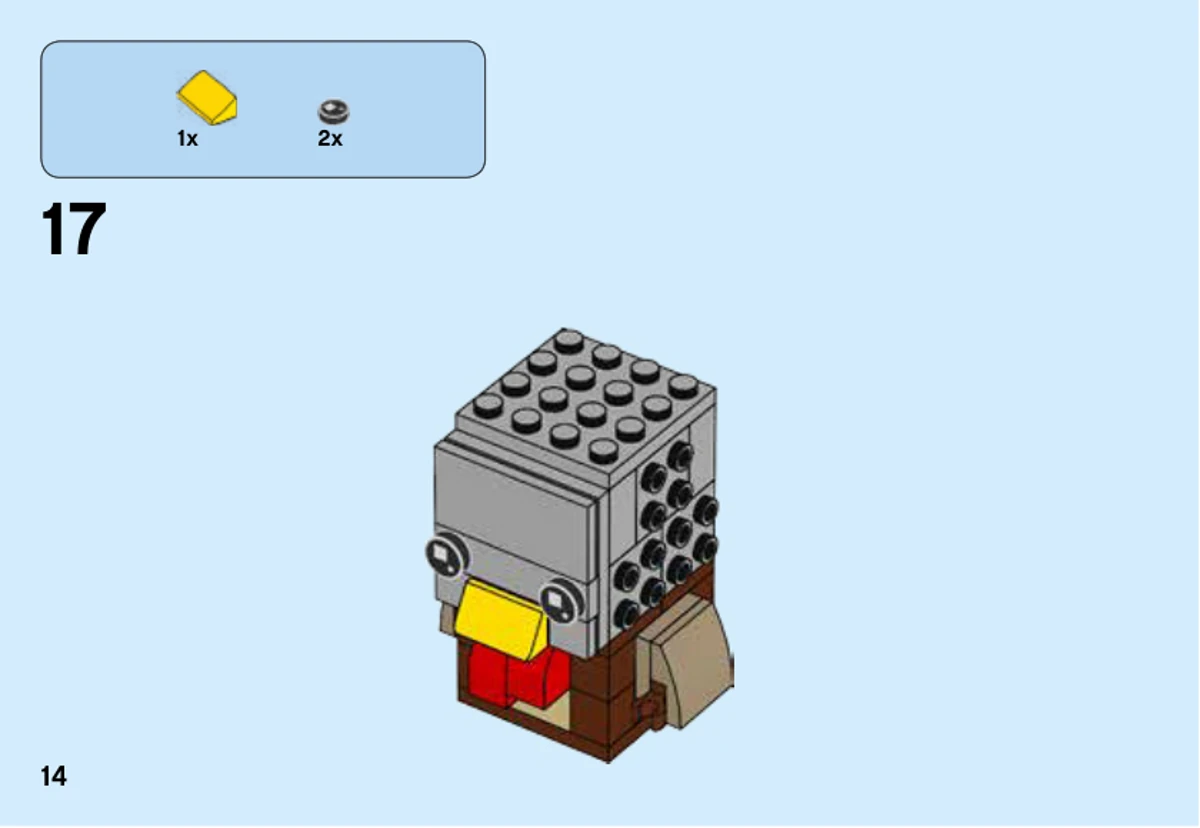 Notice officielle LEGO 40273, livret 1, page 14 : L’étape 17 fixe un bec jaune et les deux yeux ronds imprimés sur la tête grise.