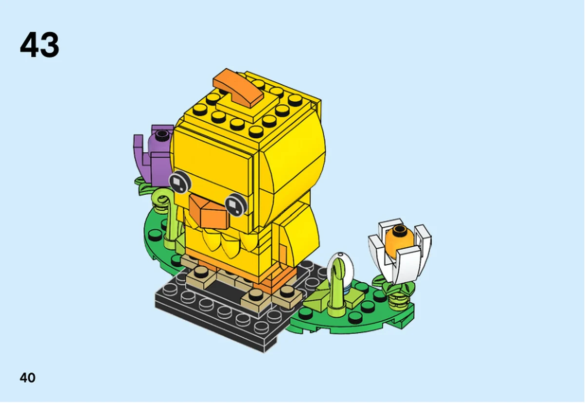 Notice officielle LEGO 40350, livret 6270799, page 40, étape 43 : Le poussin est placé entre fleurs et œufs sur le socle.