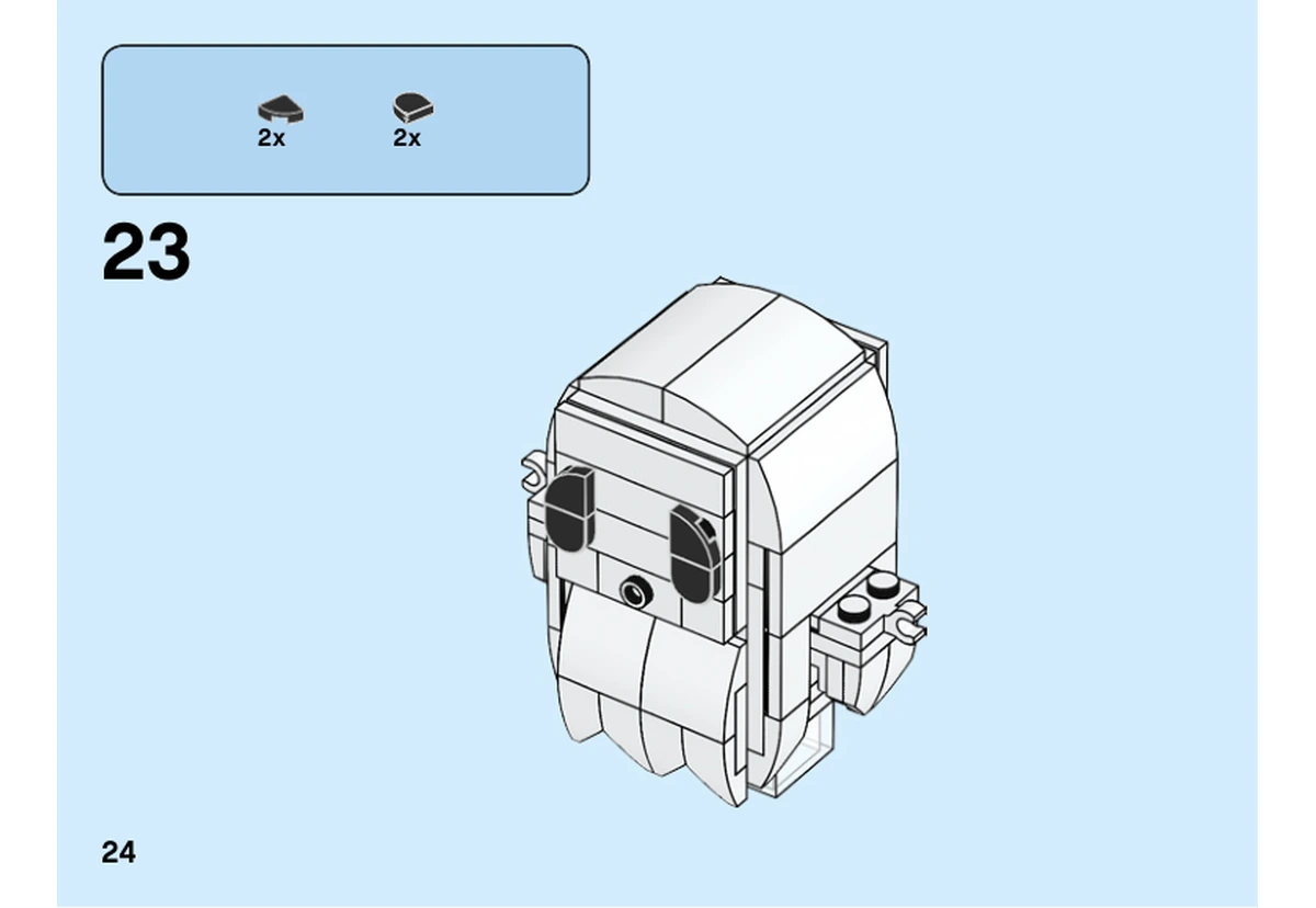 Notice officielle LEGO 40351, livret 6282727, page 24, étape 23 : Les quarts de cercle noirs complètent les yeux du fantôme.