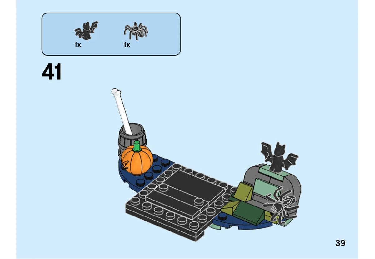 Notice officielle LEGO 40351, livret 6282727, page 39, étape 41 : Les deux animaux noirs sont ajoutés sur la tombe construite.