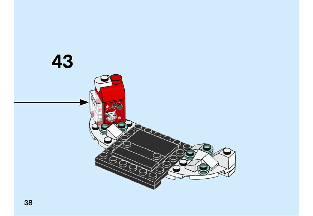 Notice officielle LEGO 40353, livret 6282734, page 38, étape 43 : La boîte rouge décorée est fixée sur le socle enneigé.