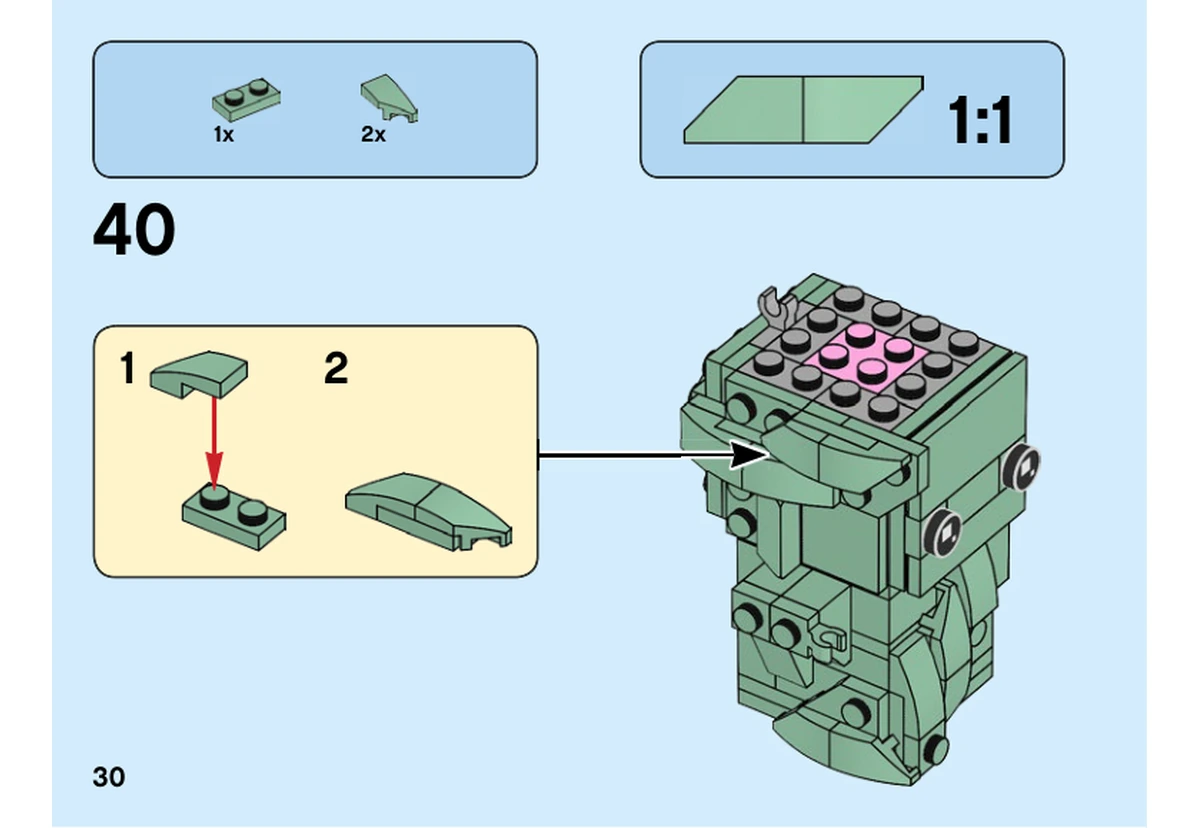 Notice LEGO 40367, page 30, étape 40 : Deux pentes courbes se montent sur une plaque avant leur pose sur le côté de la tête.