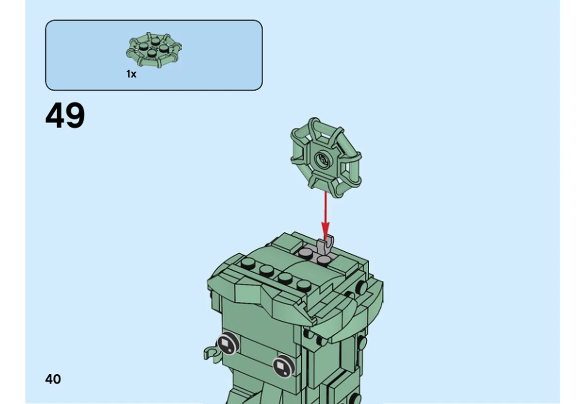 Notice LEGO 40367, page 40, étape 49 : Une plaque à cadre octogonal se fixe au sommet de la tête.