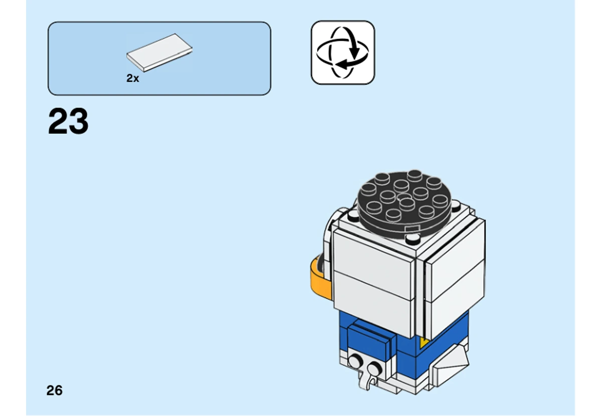 Notice officielle LEGO 40377, page PDF 26, étape 23 : Deux tuiles blanches allongées complètent la face arrière du modèle.