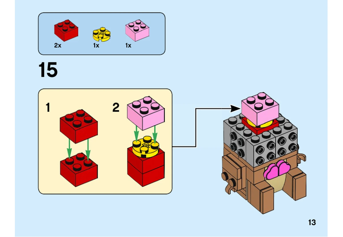 Notice LEGO 40379, livret 6309014, page 13, étape 15 : Un sous-ensemble rouge, jaune et rose rejoint le noyau gris encore ouvert de la tête.