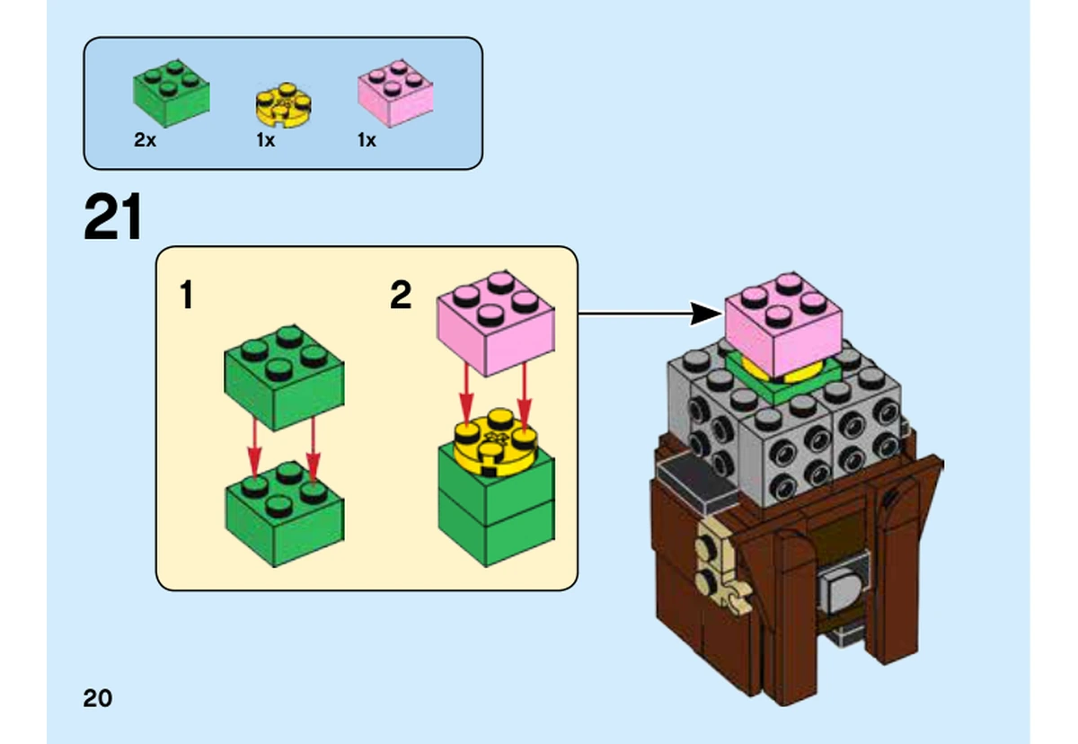 Notice LEGO 40412, livret 6324674, page 20, étape 21 : Un sous-ensemble vert, jaune et rose rejoint l’intérieur gris encore ouvert de la tête.