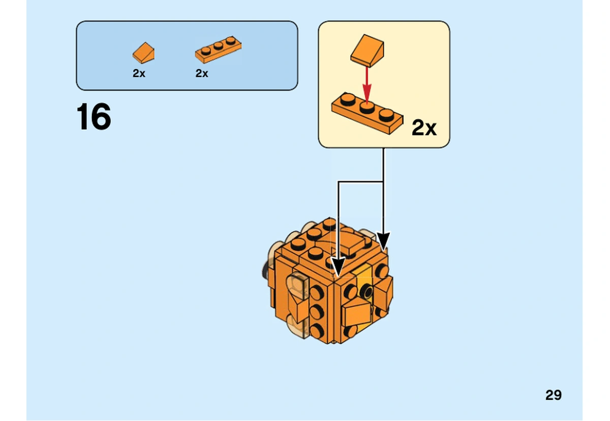 Notice LEGO 40442, livret 6357923, page 29, étape 16 : Deux petits sous-assemblages orange identiques se posent sur les côtés du poisson.