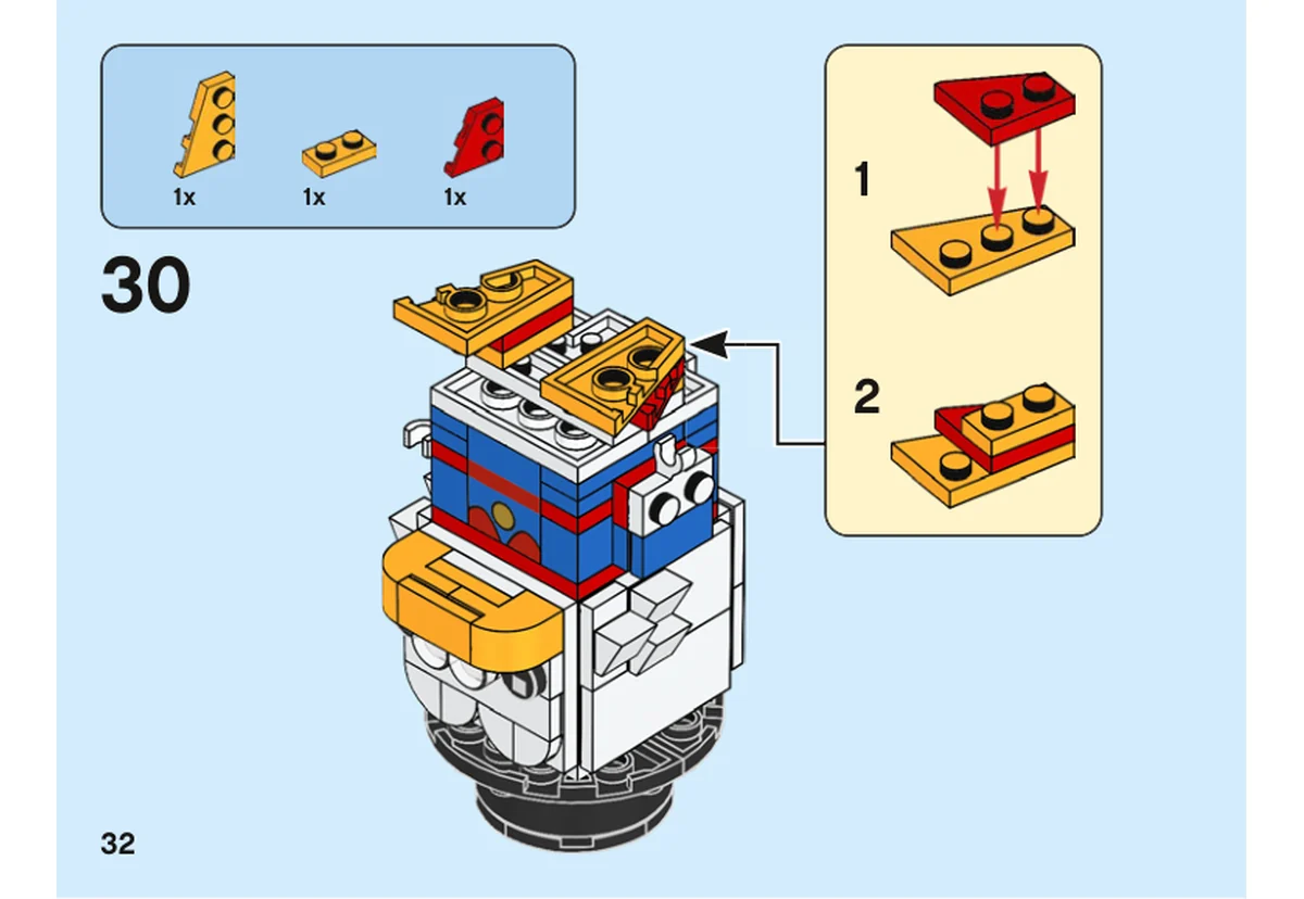 Notice officielle LEGO 40477, livret 6372473, page 32, étape 30 : Les sous-ensembles des deux pieds sont préparés et fixés alors que le personnage est retourné.