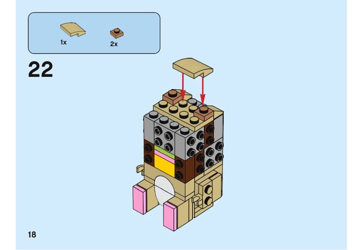 Notice officielle LEGO 40482, livret 6372365, page 18, étape 22 : Deux plaques nougat moyen et une grande tuile beige complètent le sommet encore ouvert de la tête de l’adulte.