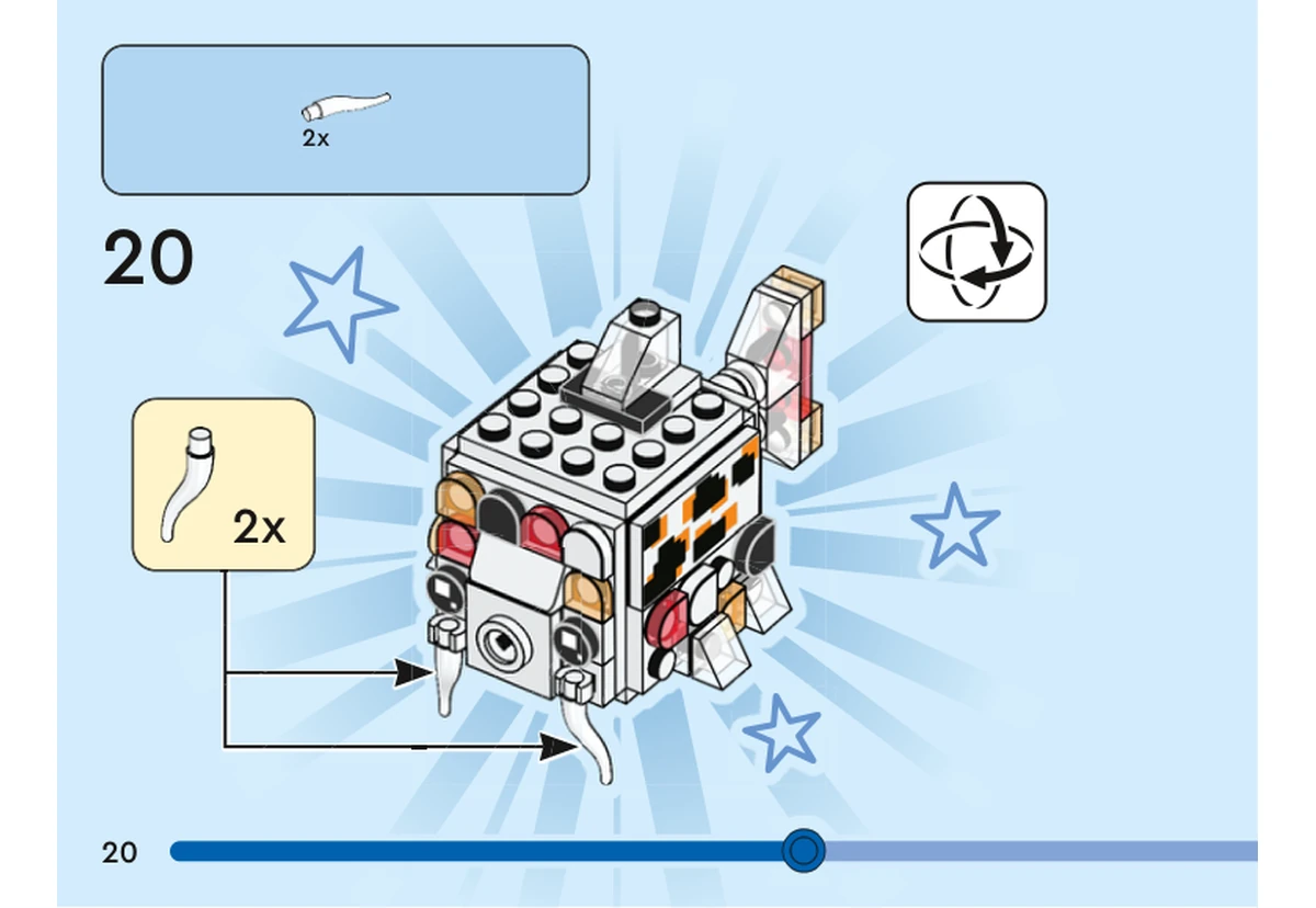 Notice officielle LEGO 40545, livret 6428250, page 20, étape 20 : Après retournement du poisson, deux pièces blanches en forme de corne sont fixées de part et d’autre de la bouche.