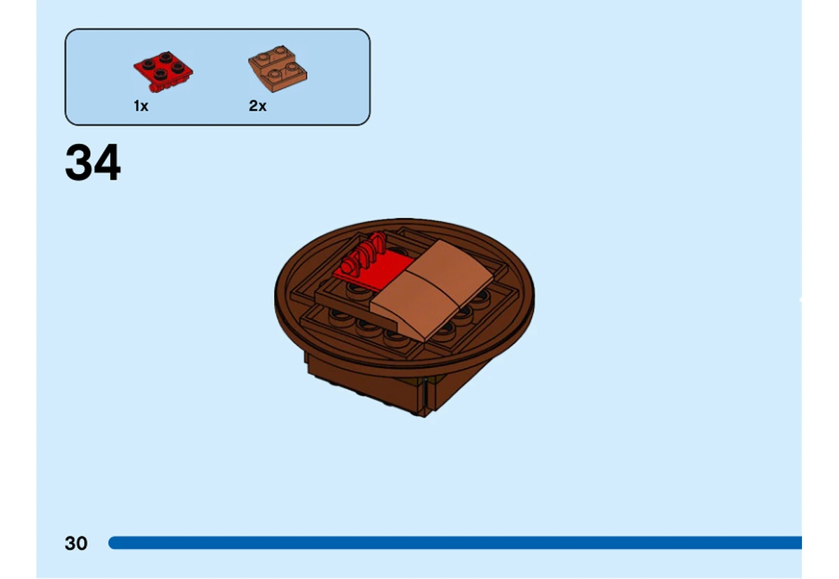 Notice officielle LEGO 40553, livret 6414475, page 30, étape 34 : Une plaque rouge et deux pièces marron sont ajoutées au dessous du chapeau, avant sa pose sur Woody.