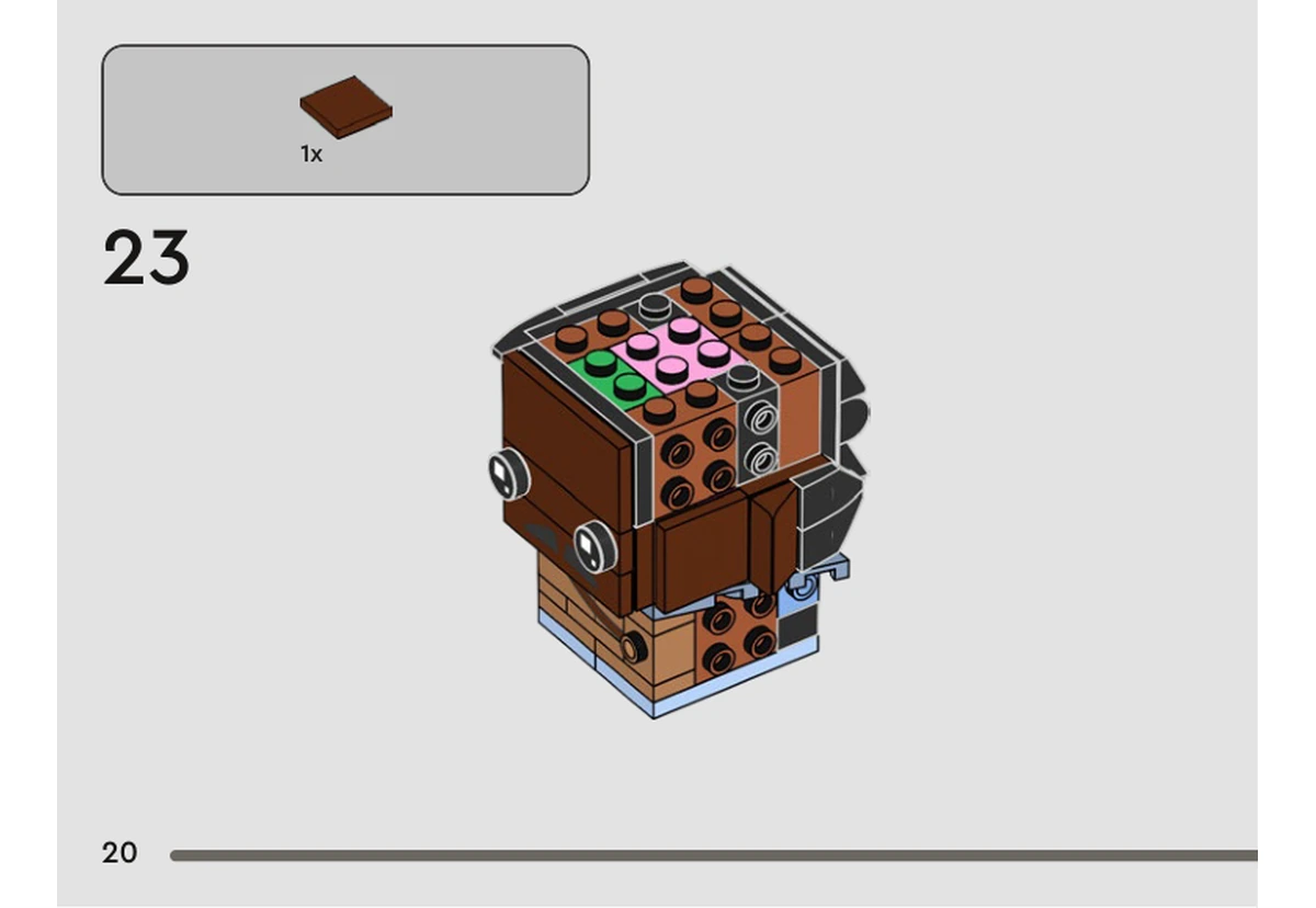Notice officielle LEGO 40623, livret 6461103, page 20, étape 23 : Une tuile marron rejoint le dessus du côté de la tête. La brique rose et plusieurs tenons du noyau restent visibles.