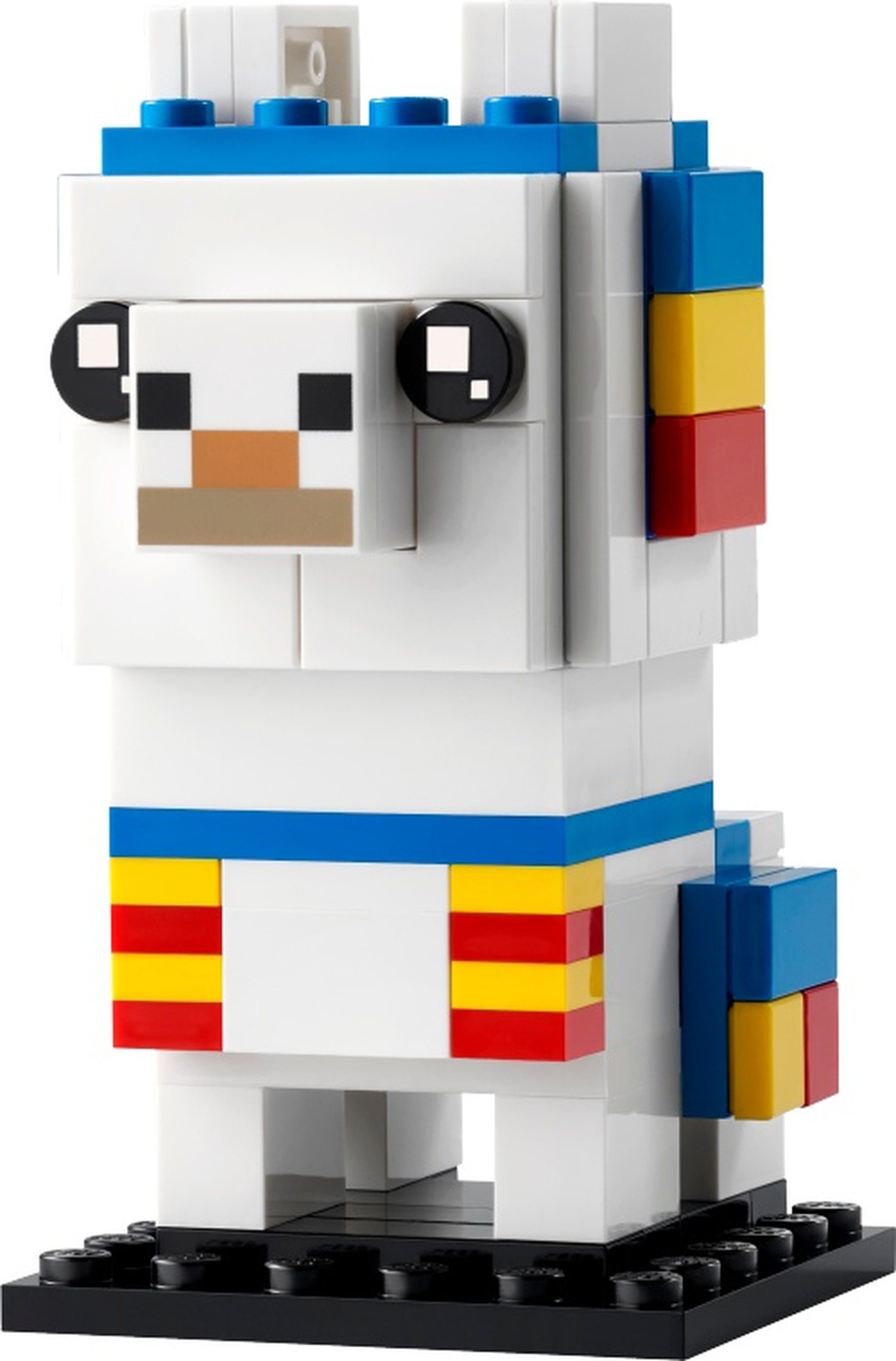 LEGO 40625 Lama : Le lama Minecraft associe corps et oreilles blancs, museau carré imprimé et couverture bleue bordée de rouge et de jaune. Ses petites pattes et son long cou différencient sa silhouette des personnages humanoïdes.