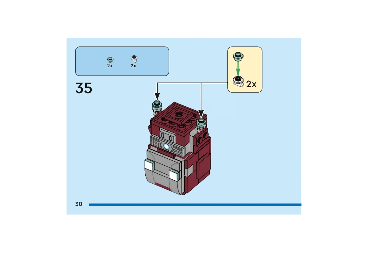 Notice officielle LEGO 40669, livret 6522963, page 30, étape 35 : Le modèle est présenté retourné. Deux petits assemblages associant une pièce bleu clair transparente et une pièce incolore sont ajoutés aux pieds.
