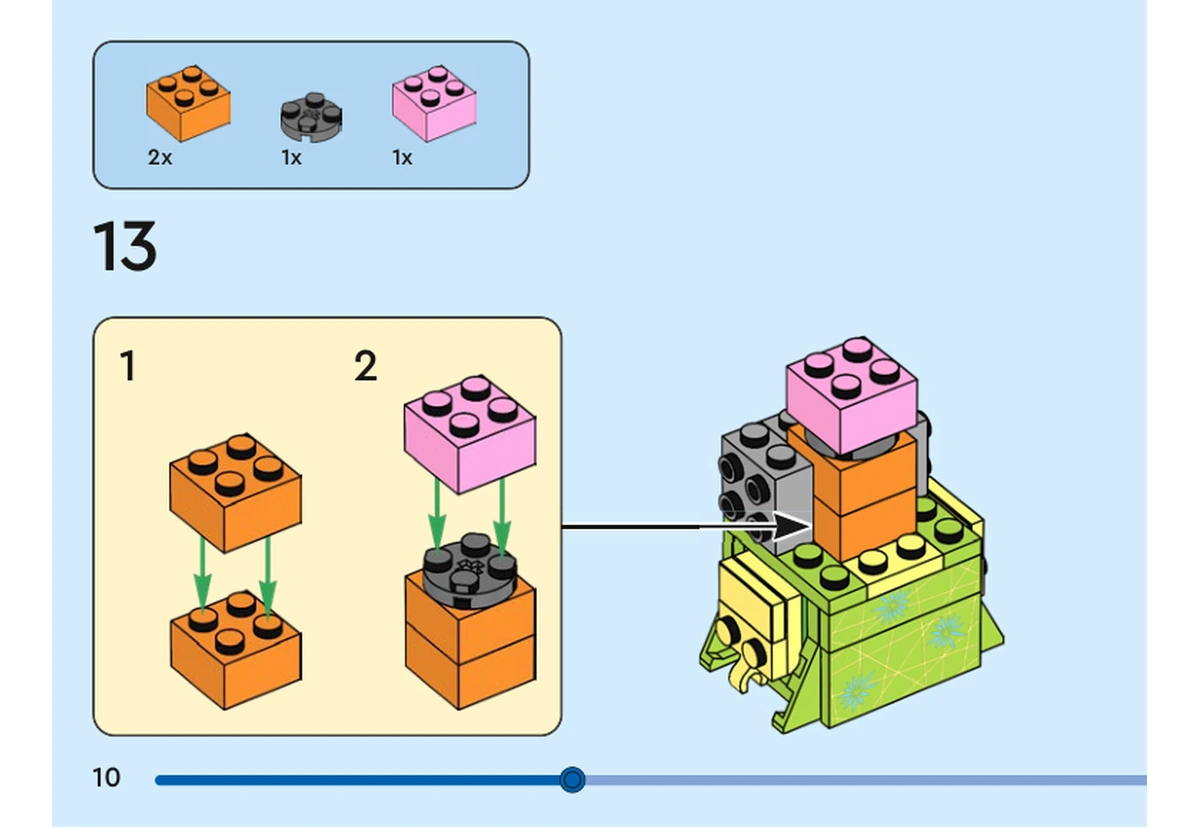 Notice officielle LEGO 40749, livret 6521399, page 10, étape 13 : Deux briques orange 2 × 2 s’empilent. Une plaque ronde gris foncé puis une brique rose 2 × 2 se fixent sur le dessus. La flèche place le petit noyau au centre de la tête encore ouverte, au-dessus du corps vert citron à fleurs.