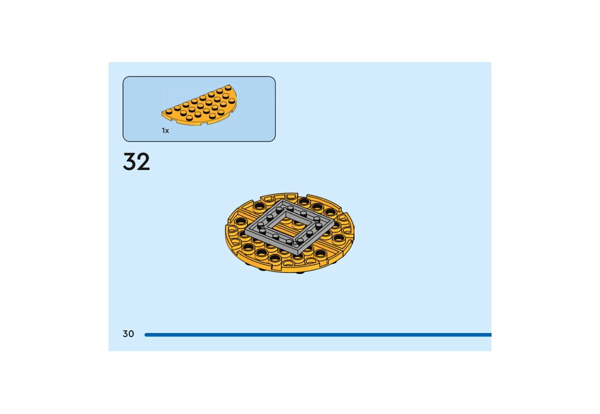 Notice officielle LEGO 40799, livret 6592656, page 30, étape 32 : La seconde plaque jaune orangé en demi-cercle complète le disque, montré à l’envers. Un cadre gris occupe le centre du dessous ; le chapeau n’est pas encore placé sur le personnage.