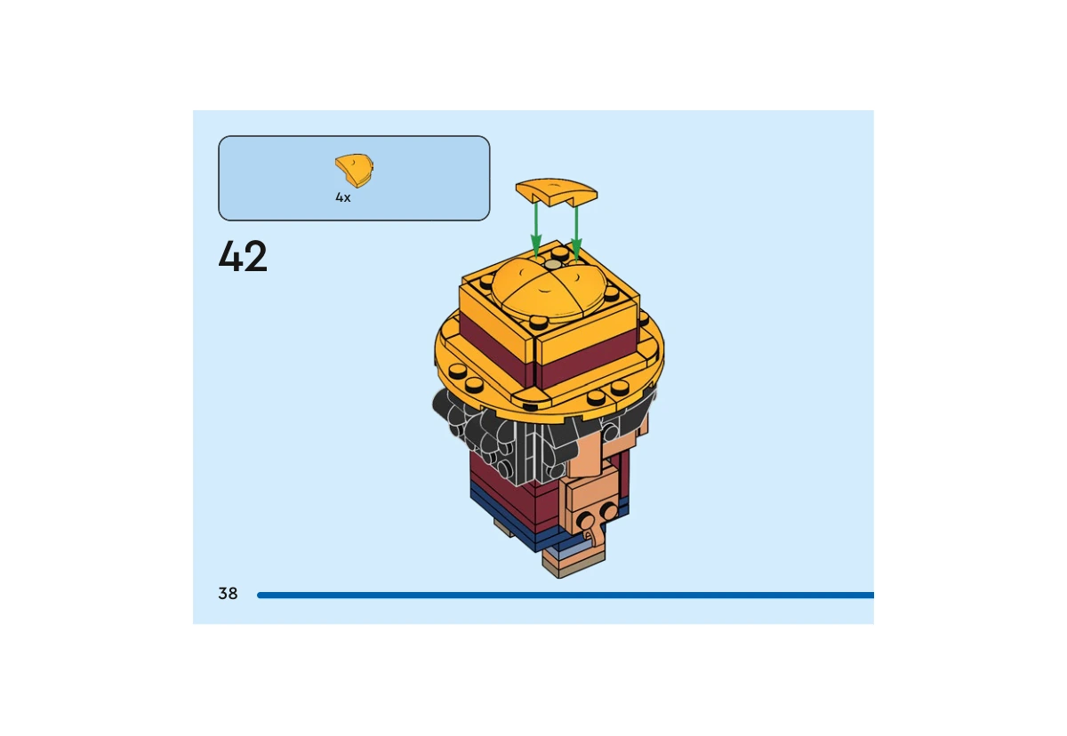 Notice officielle LEGO 40799, livret 6592656, page 38, étape 42 : Quatre pièces jaune orangé en quart de sphère sont ajoutées au sommet du chapeau. Le bandeau rouge foncé et le large bord sont déjà assemblés ; cette étape ferme la calotte.